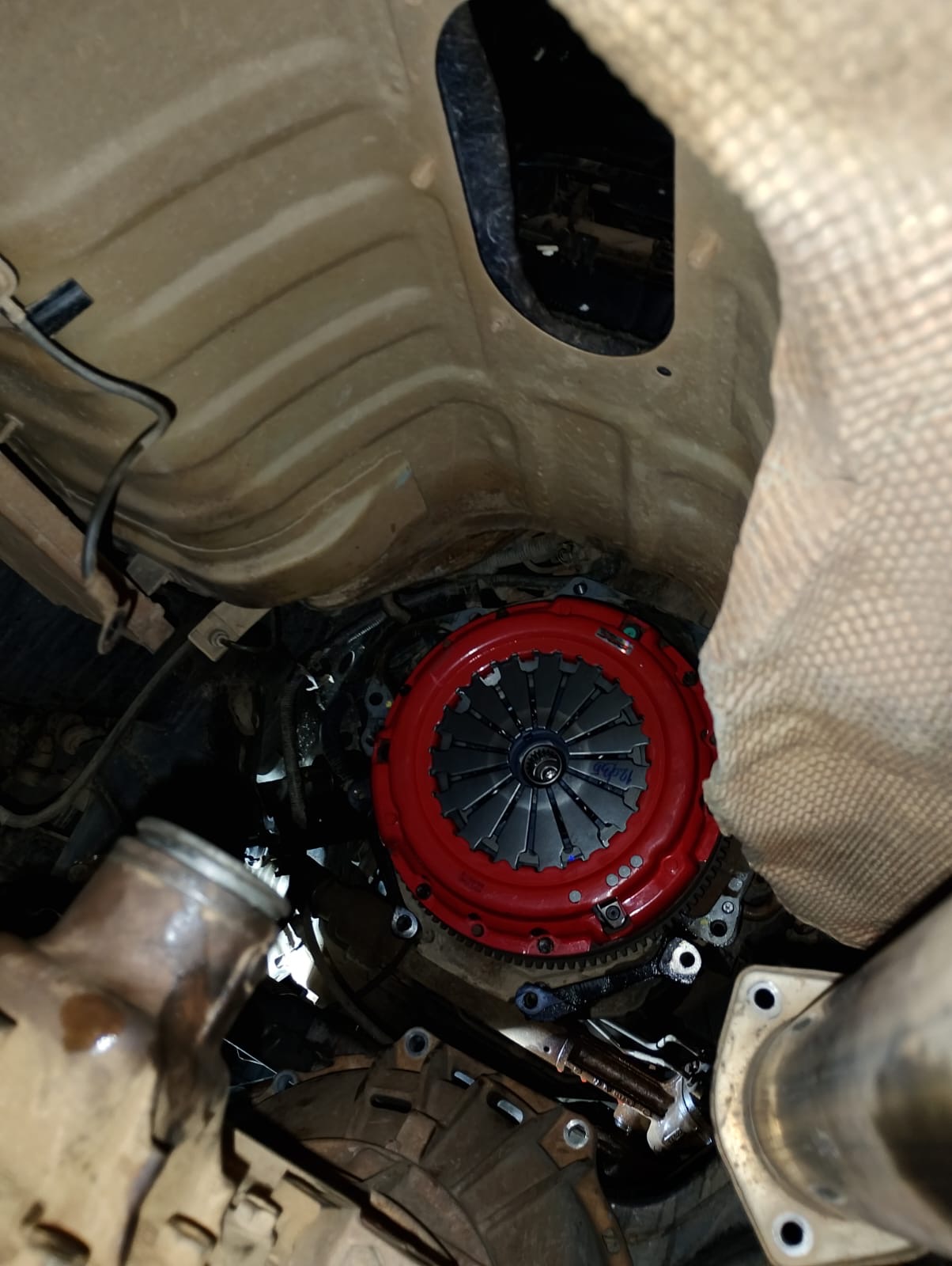 Upgraded red performance clutch installed in a customer vehicle