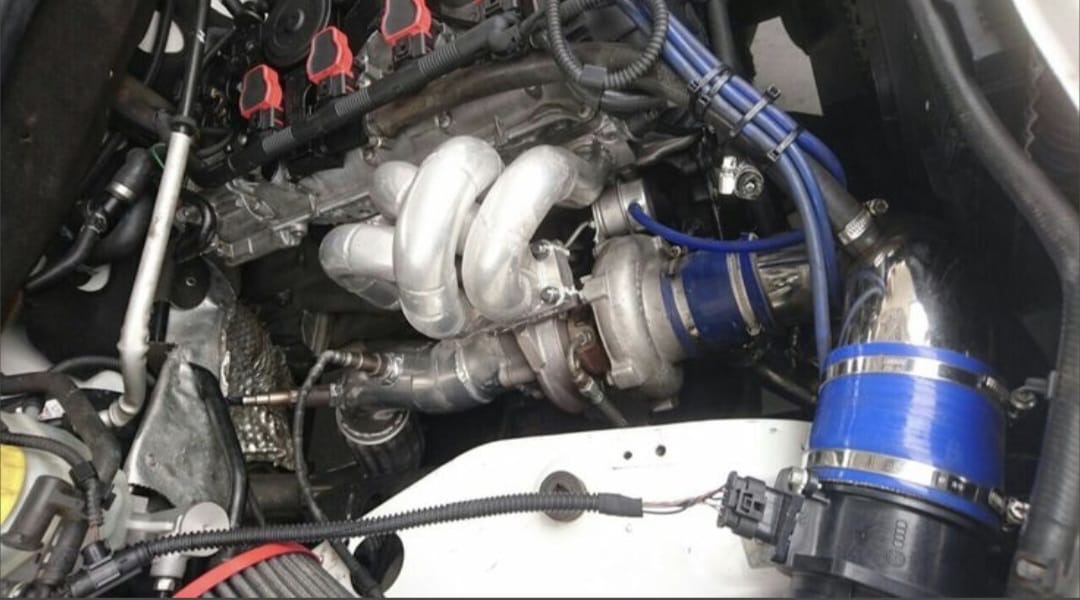 Turbocharger conversion fitted in an engine bay