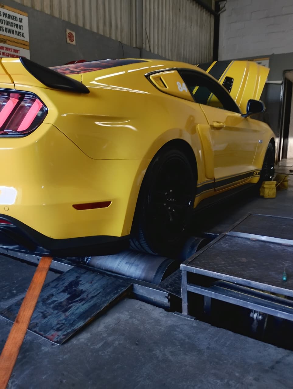Mustang GT strapped down on the dyno — dyno is available on request