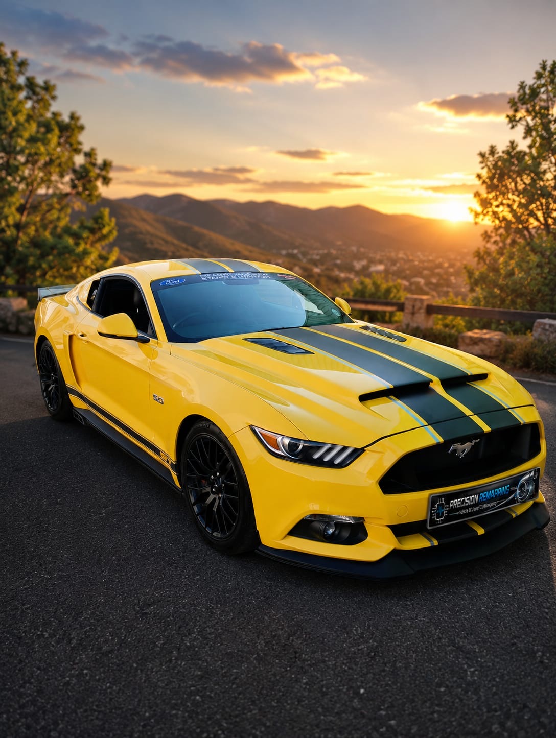 Yellow Ford Mustang GT at sunset with Precision Remapping plate